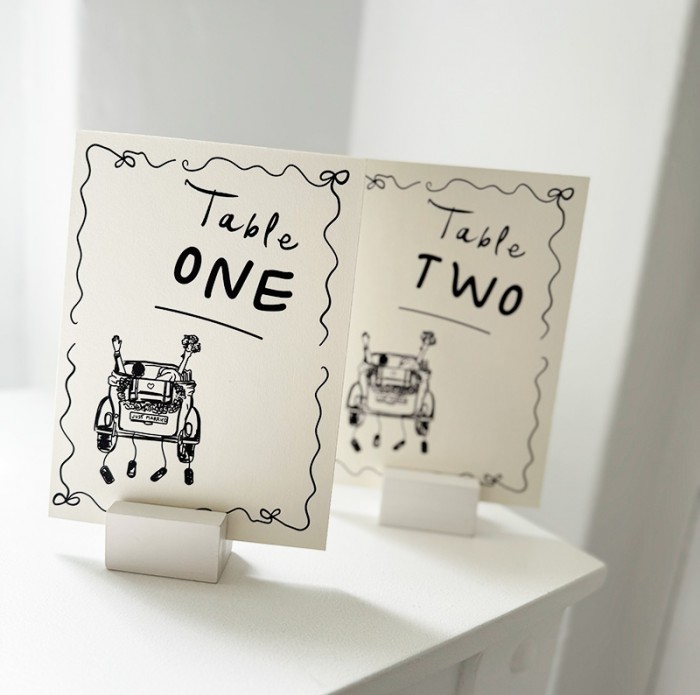 Chelsea and Rufus table number cards